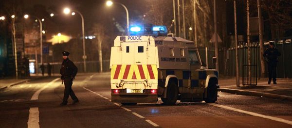 The Police Service of Northern Ireland secure the Falls road close to the scene of a bomb attack in West Belfast, Saturday, March, 15, 2014 The Police Service of Northern Ireland secure the Falls road close to the scene of a bomb attack in West Belfast, Saturday, March, 15, 2014 - Sputnik International