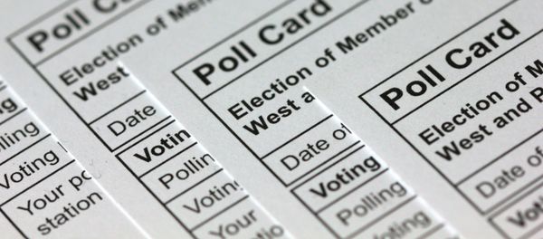 A photograph taken in London on November 14, 2019 shows polling cards for the 2019 UK general election arranged as an illustration.  - Sputnik International