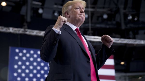 President Donald Trump shakes his fists as he finishes speaking at a rally at the Gaylord Opryland Resort and Convention Center, Tuesday, 29 May 2018, in Nashville, Tenn - Sputnik International