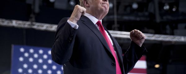 President Donald Trump shakes his fists as he finishes speaking at a rally at the Gaylord Opryland Resort and Convention Center, Tuesday, May 29, 2018, in Nashville, Tenn President Donald Trump shakes his fists as he finishes speaking at a rally at the Gaylord Opryland Resort and Convention Center, Tuesday, May 29, 2018, in Nashville, Tenn - Sputnik International