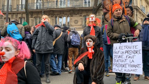 Protesters during a demonstration against French government's pensions reform plans in Paris as part of a day of national strike and protests in France, December 5, 2019 - Sputnik International