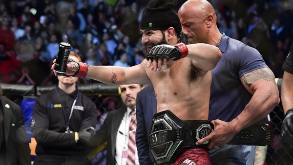 Jorge Masvidal of the United States is awarded the belt by Dwayne the Rock Johnson after his victory by TKO on a medical stoppage against Nate Diaz of the United States in the Welterweight BMF championship bout during UFC 244 at Madison Square Garden on November 02, 2019 in New York City Jorge Masvidal of the United States is awarded the belt by Dwayne the Rock Johnson after his victory by TKO on a medical stoppage against Nate Diaz of the United States in the Welterweight BMF championship bout during UFC 244 at Madison Square Garden on November 02, 2019 in New York City - Sputnik International