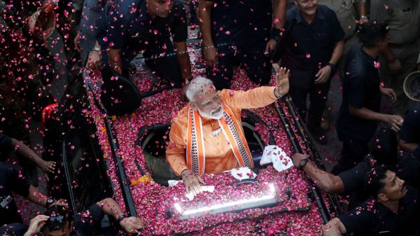 India's Prime Minister Narendra Modi waves towards his supporters during a roadshow in Varanasi, India, April 25, 2019 India's Prime Minister Narendra Modi waves towards his supporters during a roadshow in Varanasi, India, April 25, 2019 - Sputnik International