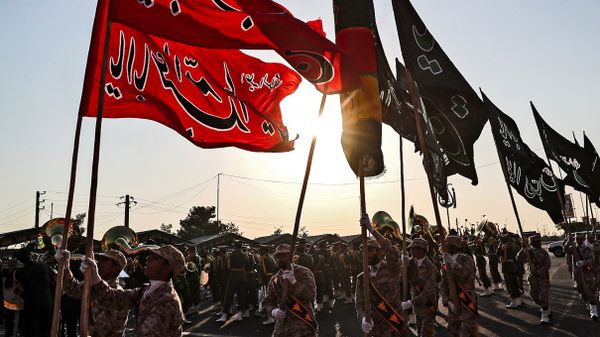A handout picture provided by the Iranian presidency on September 22, 2019 shows Members of Iran's Islamic Revolutionary Guard Corps (IRGC) marching during the annual Sacred Defence Week military parade marking the anniversary of the outbreak of the devastating 1980-1988 war with Saddam Hussein's Iraq, in the capital Tehran - Sputnik International