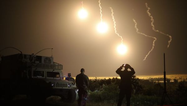 Mortars from 1st Battalion, 279th Infantry, Oklahoma National Guard light up the area around the 41st Infantry Brigade Combat Team area of operations with 120mm parachute illumination flares on 24 July, at Camp Grayling, Mich. as part of Exercise Northern Strike 19. Northern Strike is one of the largest reserve component exercises supported by the U.S. Department of Defense. Its mission is to maximize the full-spectrum combat readiness of National Guard units through realistic, cost-effective joint fires training in an adaptable environment, with an emphasis on cooperation between joint and coalition forces. - Sputnik International