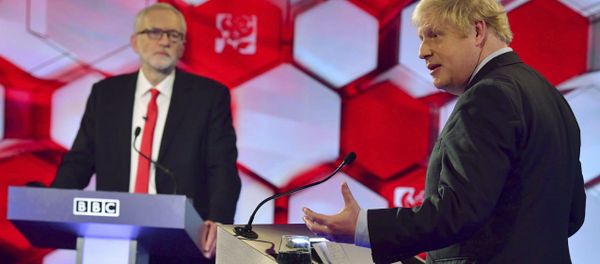 Opposition Labour Party leader Jeremy Corbyn, left, and Britain's Prime Minister Boris Johnson, during a head to head live Election Debate at the BBC TV studios Opposition Labour Party leader Jeremy Corbyn, left, and Britain's Prime Minister Boris Johnson, during a head to head live Election Debate at the BBC TV studios - Sputnik International