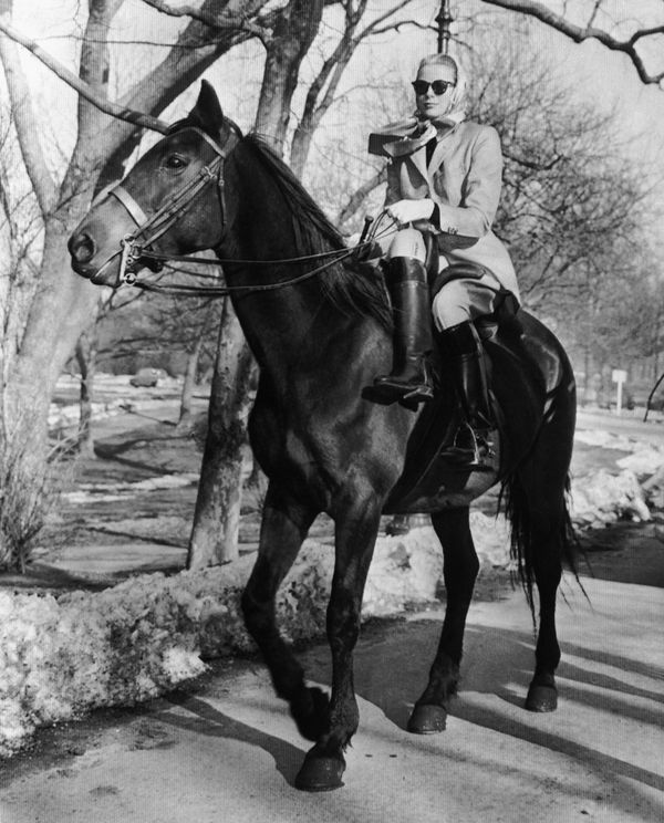 Actress Grace Kelly wears dark glasses and a babushka as she rides side-saddle through Central Park, in New York, on March 25, 1956 Actress Grace Kelly wears dark glasses and a babushka as she rides side-saddle through Central Park, in New York, on March 25, 1956 - Sputnik International