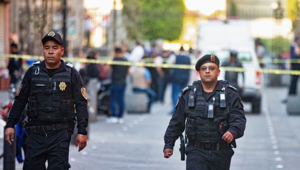 Police officers guard a crime scene where four people were killed and two injured in a shooting near Mexico's National Palace, the presidential residence in the capital's historic downtown, officials said, in Mexico City, Mexico December 7, 2019. Police officers guard a crime scene where four people were killed and two injured in a shooting near Mexico's National Palace, the presidential residence in the capital's historic downtown, officials said, in Mexico City, Mexico December 7, 2019. - Sputnik International