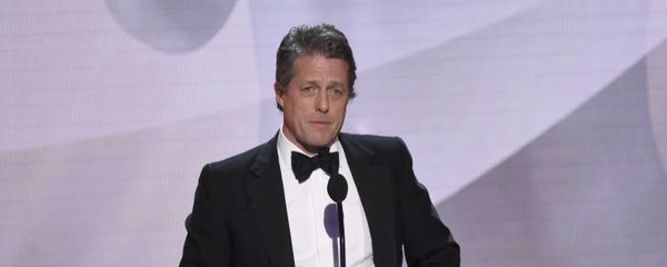 Hugh Grant presents the award for outstanding performance by an ensemble in a drama series at the 25th annual Screen Actors Guild Awards Hugh Grant presents the award for outstanding performance by an ensemble in a drama series at the 25th annual Screen Actors Guild Awards - Sputnik International