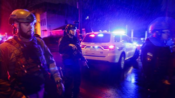 Law enforcement personnel guard near the scene following a shooting, Tuesday, Dec. 10, 2019 Law enforcement personnel guard near the scene following a shooting, Tuesday, Dec. 10, 2019 - Sputnik International