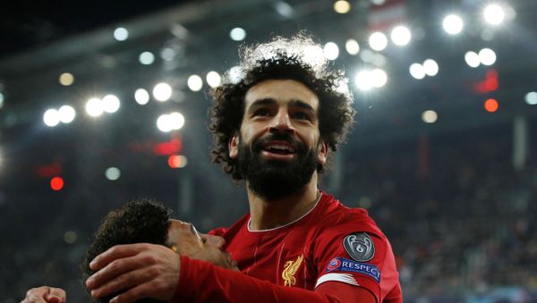 Soccer Football - Champions League - Group E - FC Salzburg v Liverpool - Red Bull Arena Salzburg, Salzburg, Austria - 10 December 2019  Liverpool's Mohamed Salah celebrates scoring their second goal with Alex Oxlade-Chamberlain  - Sputnik International