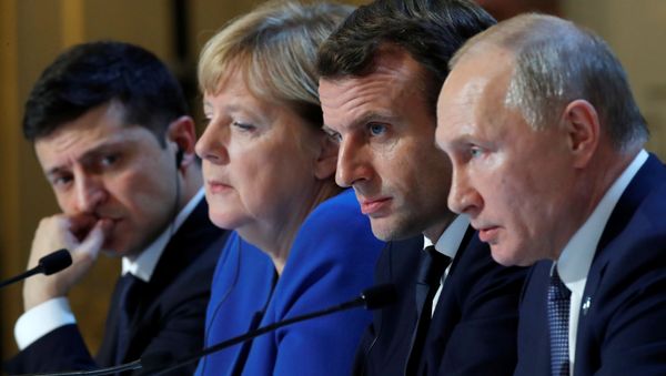 Ukraine's President Volodymyr Zelenskiy, German Chancellor Angela Merkel, French President Emmanuel Macron and Russia's President Vladimir Putin attend a press conference after a summit on Ukraine at the Elysee Palace, in Paris, on December 9, 2019 - Sputnik International