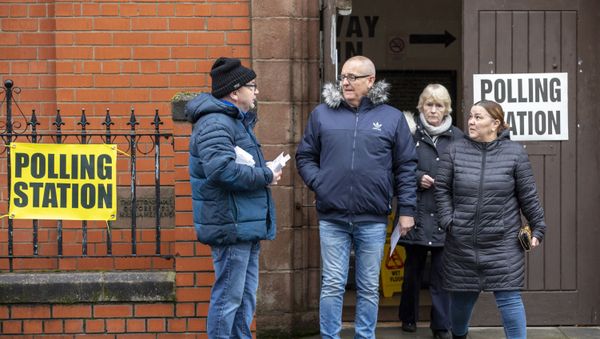 Voters leave from a polling station in Belfast, Northern Ireland, as Britain holds a general election on December 12, 2019. Voters leave from a polling station in Belfast, Northern Ireland, as Britain holds a general election on December 12, 2019. - Sputnik International