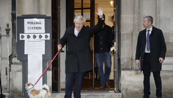 Britain's Prime Minister and Conservative Party leader Boris Johnson with his dog Dilyn leaves after voting in the general election at Methodist Central Hall, Westminster, London, Thursday, Dec. 12, 2019. Britain's Prime Minister and Conservative Party leader Boris Johnson with his dog Dilyn leaves after voting in the general election at Methodist Central Hall, Westminster, London, Thursday, Dec. 12, 2019. - Sputnik International