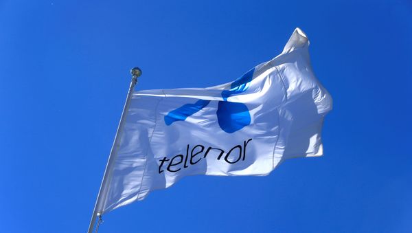 Telenor flag flutters next to the company's headquarters in Fornebu, Norway, June 1, 2017. Telenor flag flutters next to the company's headquarters in Fornebu, Norway, June 1, 2017. - Sputnik International