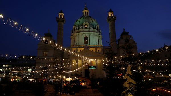 A Christmas market is pictured in front of Karslkirche in Vienna, Austria December 4, 2019 A Christmas market is pictured in front of Karslkirche in Vienna, Austria December 4, 2019 - Sputnik International