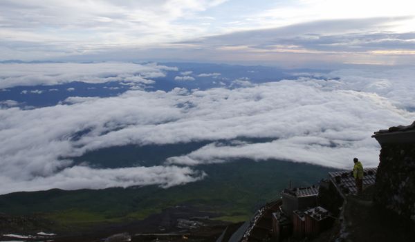 A climber views a landscape from Mount Fuji in Fujiyoshida city, Yamanashi prefecture, Japan, 4 July 2013. Japan's most iconic landmark, Mount Fuji, the 3,776-metre-tall mountain, was selected as a World Heritage site in June. A climber views a landscape from Mount Fuji in Fujiyoshida city, Yamanashi prefecture, Japan, 4 July 2013. Japan's most iconic landmark, Mount Fuji, the 3,776-metre-tall mountain, was selected as a World Heritage site in June. - Sputnik International