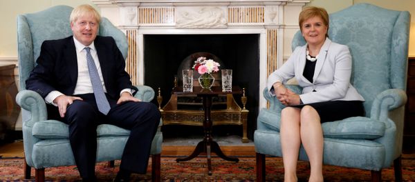 Britain's Prime Minister Boris Johnson poses for a photograph with Scotland's First Minister Nicola Sturgeon at Bute House in Edinburgh, Britain, July 29, 2019 - Sputnik International