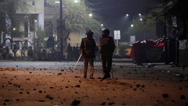 Policemen stand outside the Jamia Milia University following a protest against a new citizenship law, in New Delhi, India, December 15, 2019 Policemen stand outside the Jamia Milia University following a protest against a new citizenship law, in New Delhi, India, December 15, 2019 - Sputnik International