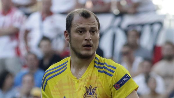 FILE - In this Tuesday, June 21, 2016 file photo, Ukraine's Roman Zozulya protest to a referee during the Euro 2016 Group C soccer match between Ukraine and Poland at the Velodrome stadium in Marseille, France.  The Ukrainian player called “a Nazi” by fans in a Spanish second-division match suspended because of the insults had already been targeted by fans last season. The game between Rayo Vallecano and Albacete  on Sunday, Dec. 15, 2019 was halted at halftime after Rayo fans used abusive language against Zozulia in chants and a in a banner. (AP Photo/Ariel Schalit, File) - Sputnik International