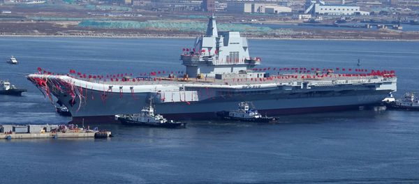 Type 001A, China's second aircraft carrier, is transferred from the dry dock into the water during a launch ceremony at Dalian shipyard in Dalian, northeast China's Liaoning Province, April 26, 2017 Type 001A, China's second aircraft carrier, is transferred from the dry dock into the water during a launch ceremony at Dalian shipyard in Dalian, northeast China's Liaoning Province, April 26, 2017 - Sputnik International