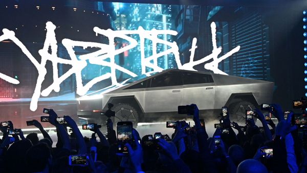 Nov 21, 2019;  Hawthorne, CA, U.S.A; The Tesla Cybertruck takes the stage at an unveiling of the long awaited pickup truck from the company at the TeslaDesign Studio in Hawthorne, Calif. - Sputnik International