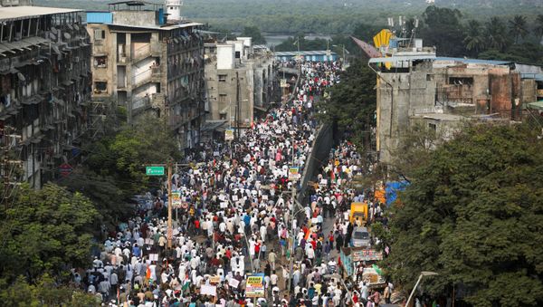 Demonstrators walk during a protest march against a new citizenship law, on the outskirts of Mumbai, India, December 18, 2019. REUTERS/Francis Mascarenhas - Sputnik International