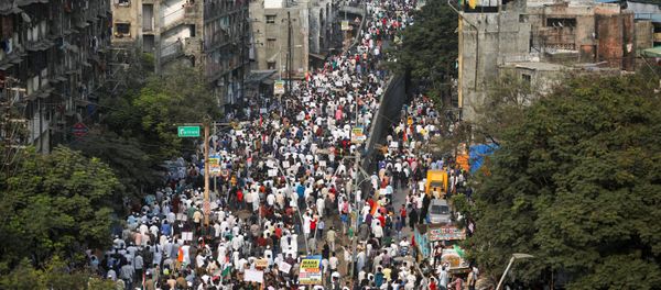Demonstrators walk during a protest march against a new citizenship law, on the outskirts of Mumbai, India, December 18, 2019. REUTERS/Francis Mascarenhas Demonstrators walk during a protest march against a new citizenship law, on the outskirts of Mumbai, India, December 18, 2019. REUTERS/Francis Mascarenhas - Sputnik International