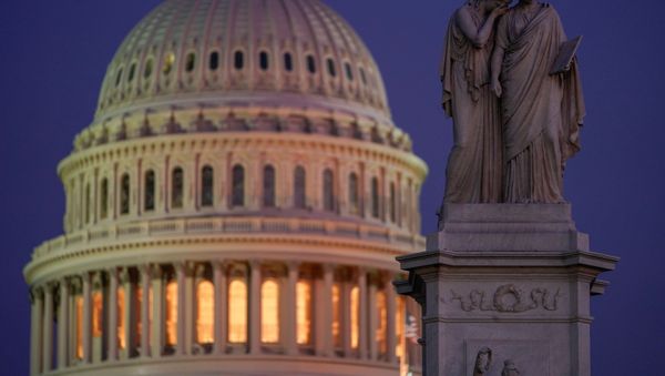 The Peace Monument stands in front of the U.S. Capitol prior to a vote in the U.S. House of Representatives on two articles of impeachment against U.S. President Donald Trump in Washington, U.S., December 18, 2019. - Sputnik International