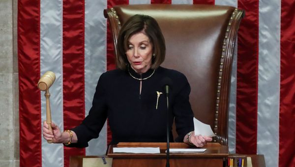 U.S. Speaker of the House Nancy Pelosi (D-CA) bangs the gavel to adjourn the House of Representatives after representatives voted in favor of two counts of impeachment against U.S. President Donald Trump in the House Chamber of the U.S. Capitol in Washington, U.S., December 18, 2019. U.S. Speaker of the House Nancy Pelosi (D-CA) bangs the gavel to adjourn the House of Representatives after representatives voted in favor of two counts of impeachment against U.S. President Donald Trump in the House Chamber of the U.S. Capitol in Washington, U.S., December 18, 2019. - Sputnik International