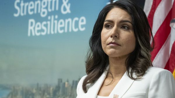 Democratic presidential candidate U.S. Rep. Tulsi Gabbard, D-Hawaii, listens as family members of victims of the terrorist attacks on 9/11 speak during a news conference at the 9/11 Tribute Museum, Tuesday, Oct. 29, 2019, in New York. - Sputnik International