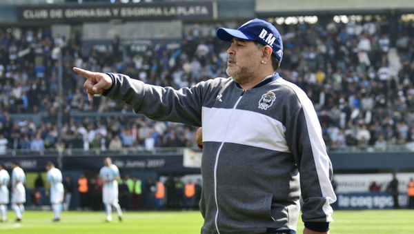 Diego Maradona, head coach of Gimnasia y Esgrima La Plata soccer team, points prior to his team's local tournament match against Racing Club at Juan Carmelo Zerillo stadium in La Plata, Argentina, Sunday, Sept. 15, 2019 - Sputnik International