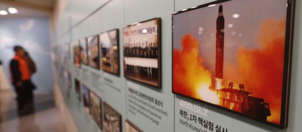 In this Friday, Dec. 13, 2019, photo, an image showing North Korea's missile launch is displayed at the Unification Observation Post in Paju, South Korea, near the border with North Korea - Sputnik International
