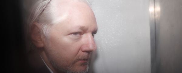 WikiLeaks founder Julian Assange is seen in a prison van traveling to Westminster Magistrates Court in London, Friday, Dec. 20, 2019. Assange is expected to appear in person before Westminster Magistrates in a private hearing related to a Spanish criminal case about alleged surveillance at the Ecuador embassy - Sputnik International
