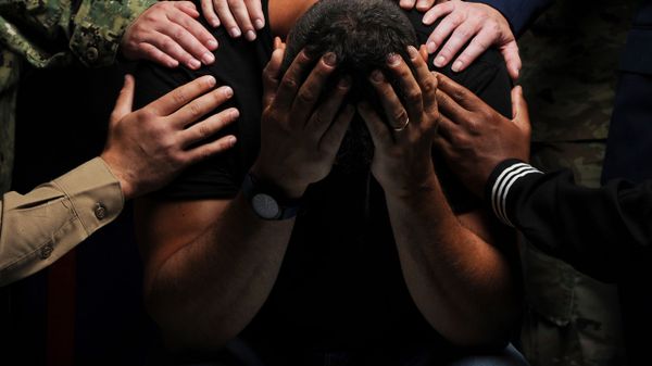 Jason Johnston, middle, poses for a photo at the Training Support Center Visual Information office located on Panzer Kaserne, Stuttgart, Germany on 12 July 2019. The image was used for the Army Substance Abuse Program – Suicide Awareness Month - Sputnik International