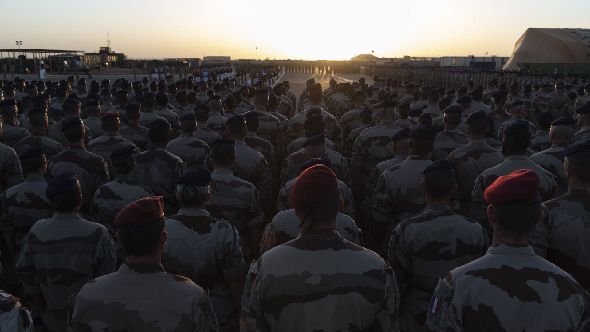 In this Saturday, Nov. 30, 2019 photo provided by French Defense Communication and Audiovisual Department (ECPAD), French soldiers attend a ceremony before loading the coffins of the 13 French soldiers into a military plane, in Gao, Mali. France will pay Monday a national homage for the 13 French soldiers killed inan helicopter collision while fighting Islamic State group-linked extremists In this Saturday, Nov. 30, 2019 photo provided by French Defense Communication and Audiovisual Department (ECPAD), French soldiers attend a ceremony before loading the coffins of the 13 French soldiers into a military plane, in Gao, Mali. France will pay Monday a national homage for the 13 French soldiers killed inan helicopter collision while fighting Islamic State group-linked extremists - Sputnik International, 1920, 20.05.2021
