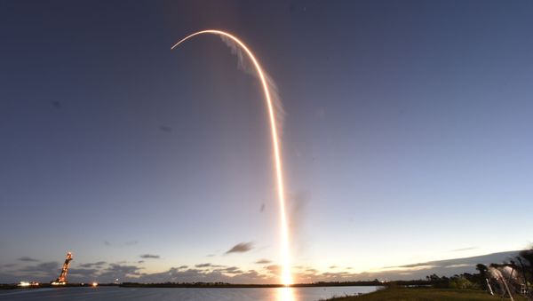 The Boeing CST-100 Starliner spacecraft, atop an ULA Atlas V rocket - Sputnik International