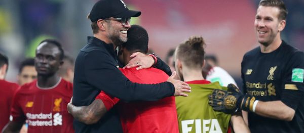 Club World Cup - Final - Liverpool v Flamengo - Khalifa International Stadium, Doha, Qatar - December 21, 2019  Liverpool manager Juergen Klopp and his players celebrate winning the Club World Cup - Sputnik International