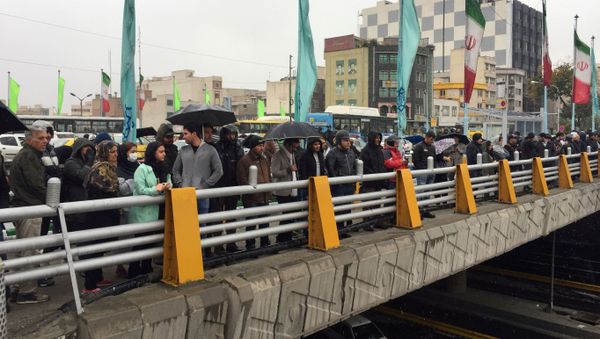 People stands in the street to show their protest against increased gas price in Tehran, Iran November 16, 2019 - Sputnik International