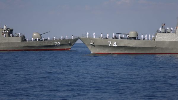 Warships sail in the Sea of Oman during the third day of joint Iran, Russia and China naval war games in Chabahar port, at the Sea of Oman, Iran, December 29, 2019 - Sputnik International
