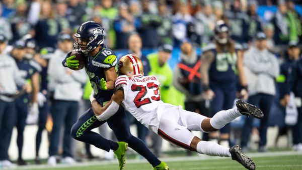 Dec 29, 2019; Seattle, Washington, USA; San Francisco 49ers cornerback Ahkello Witherspoon (23) dives to tackle Seattle Seahawks wide receiver Tyler Lockett (16) during the first half at CenturyLink Field - Sputnik International