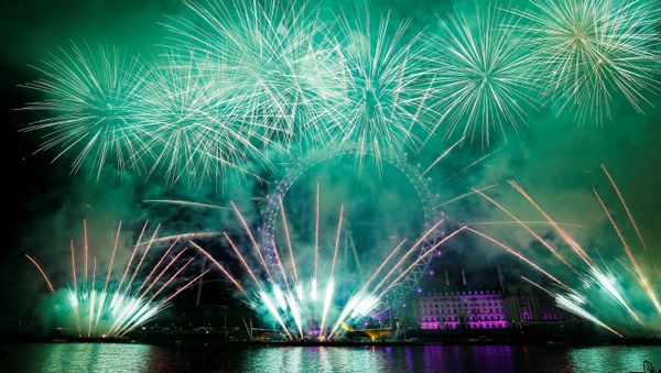 Fireworks explode over the London Eye wheel during New Year celebrations in central London, Britain, January 1, 2020.  - Sputnik International