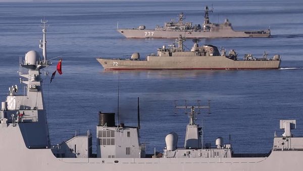 A photo shows a view of the Chinese People's Liberation Army Navy Surface Force Type 052D destroyer Xining (117), the Islamic Republic of Iran Navy frigate ALBORZ (72), and the Russian Navy Neustrashimyy-class frigate Yaroslav Mudry (777) during joint Iran-Russia-China naval drills in the Indian Ocean and the Gulf of Oman - Sputnik International