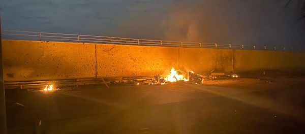 A picture shows a destroyed vehicle on fire following a US strike on January 3, 2020 on Baghdad international airport road in which top Iranian commander Qasem Soleimani was killed along with eight others, including the deputy head of Iraq's powerful Hashed al-Shaabi paramilitary force. A picture shows a destroyed vehicle on fire following a US strike on January 3, 2020 on Baghdad international airport road in which top Iranian commander Qasem Soleimani was killed along with eight others, including the deputy head of Iraq's powerful Hashed al-Shaabi paramilitary force. - Sputnik International
