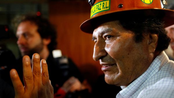 Former Bolivian President Evo Morales waves to supporters after a news conference following a meeting with members of the Movimiento al Socialismo (MAS) party to fix the date and place where the Bolivian presidential candidate for the MAS party will be chosen, in Buenos Aires, Argentina December 29, 2019. - Sputnik International