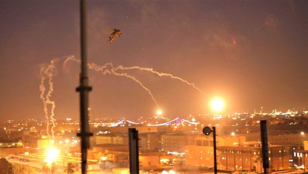 U.S. Army AH-64 Apache helicopters from 1st Battalion, 227th Aviation Regiment, 34th Combat Aviation Brigade, launch flares as they conduct overflights of the U.S. Embassy in Baghdad U.S. Army AH-64 Apache helicopters from 1st Battalion, 227th Aviation Regiment, 34th Combat Aviation Brigade, launch flares as they conduct overflights of the U.S. Embassy in Baghdad - Sputnik International