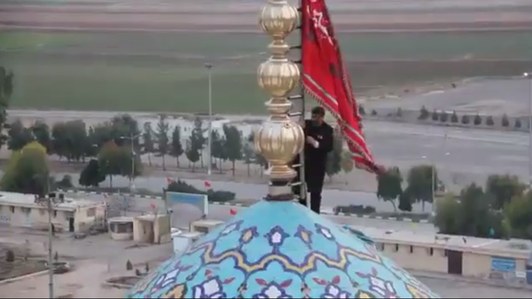 Red Flag of Revenge spotted over Major Shiite Mosque in Qom, Iran. Screenshot from Iranian television. Red Flag of Revenge spotted over Major Shiite Mosque in Qom, Iran. Screenshot from Iranian television. - Sputnik International