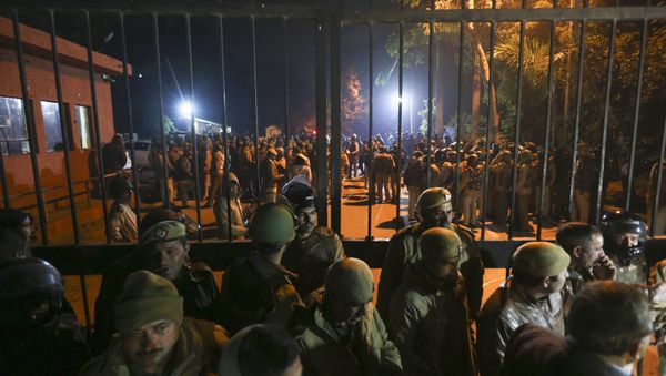 In this late Sunday, Jan.5, 2020 photo, police arrive at the Jawaharlal Nehru University after masked assailants beat students and teachers with sticks in New Delhi, India.  - Sputnik International