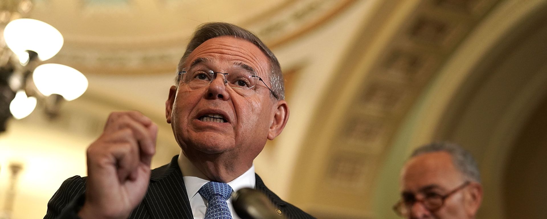 U.S. Sen. Bob Menendez speaks as Senate Minority Leader Sen. Chuck Schumer listens during a news briefing - Sputnik International, 1920, 05.07.2023
