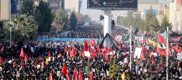 Iranian people attend a funeral procession and burial for Iranian Major-General Qassem Soleimani, head of the elite Quds Force, who was killed in an airstrike at Baghdad airport, at his hometown in Kerman, Iran January 7, 2020 Iranian people attend a funeral procession and burial for Iranian Major-General Qassem Soleimani, head of the elite Quds Force, who was killed in an airstrike at Baghdad airport, at his hometown in Kerman, Iran January 7, 2020 - Sputnik International